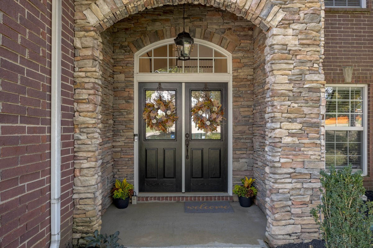3002 Sakari Circle Spring Hill, TN 37174 - Photo 4 of 56 a front view of a house with a yard