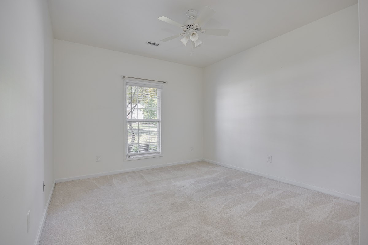 3002 Sakari Circle Spring Hill, TN 37174 - Photo 41 of 56 wooden floor in an empty room with a window