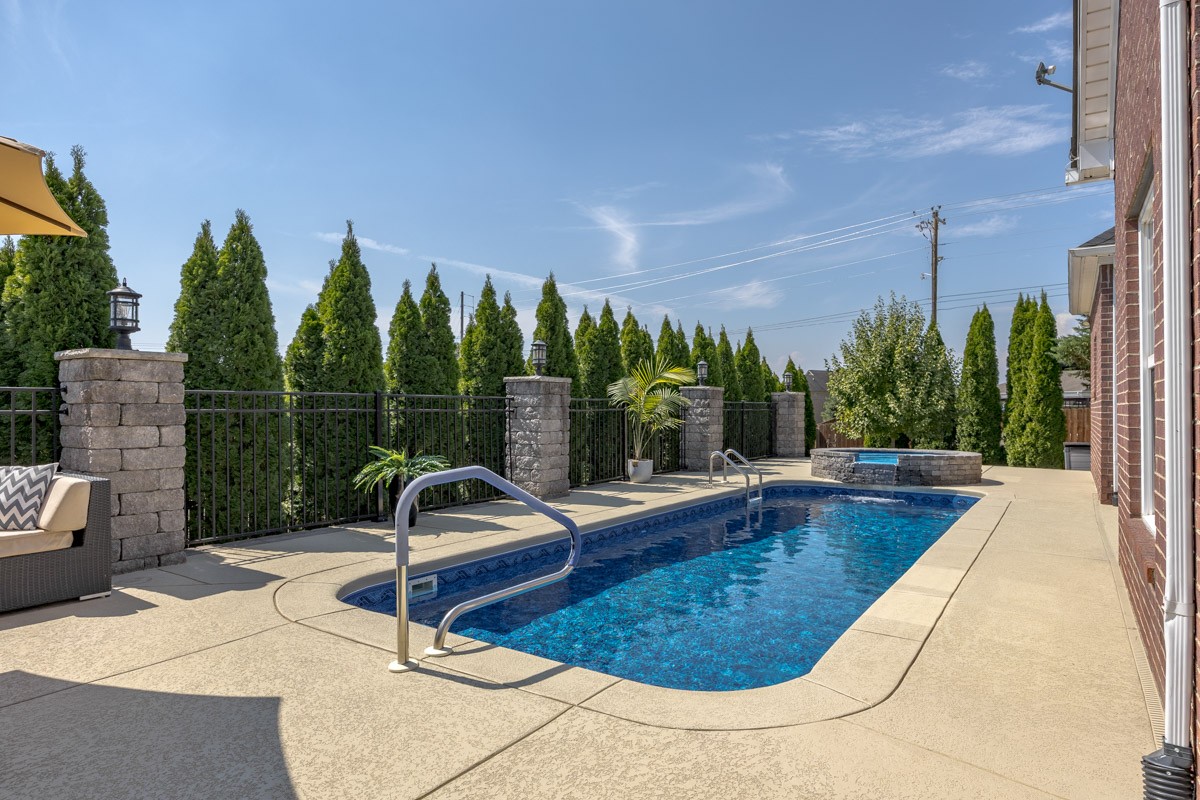3002 Sakari Circle Spring Hill, TN 37174 - Photo 46 of 56 a view of swimming pool with outdoor seating and plants