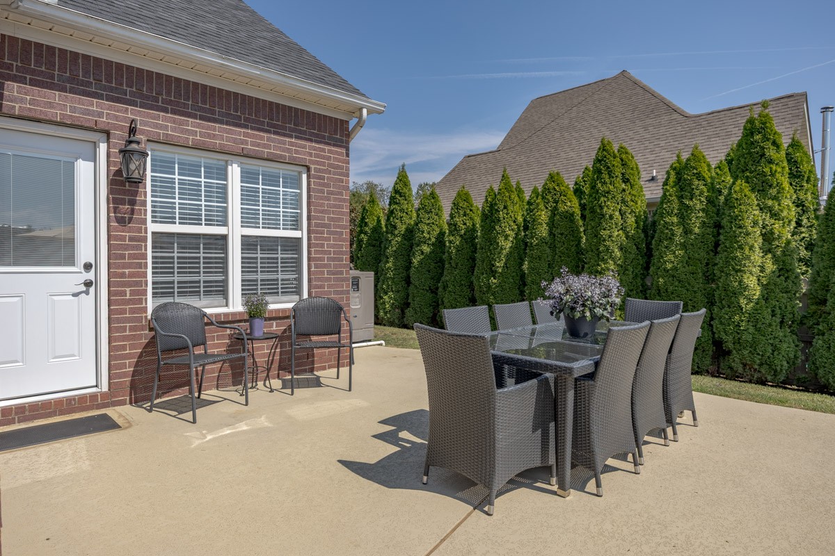 3002 Sakari Circle Spring Hill, TN 37174 - Photo 52 of 56 a view of a tables and chairs in patio