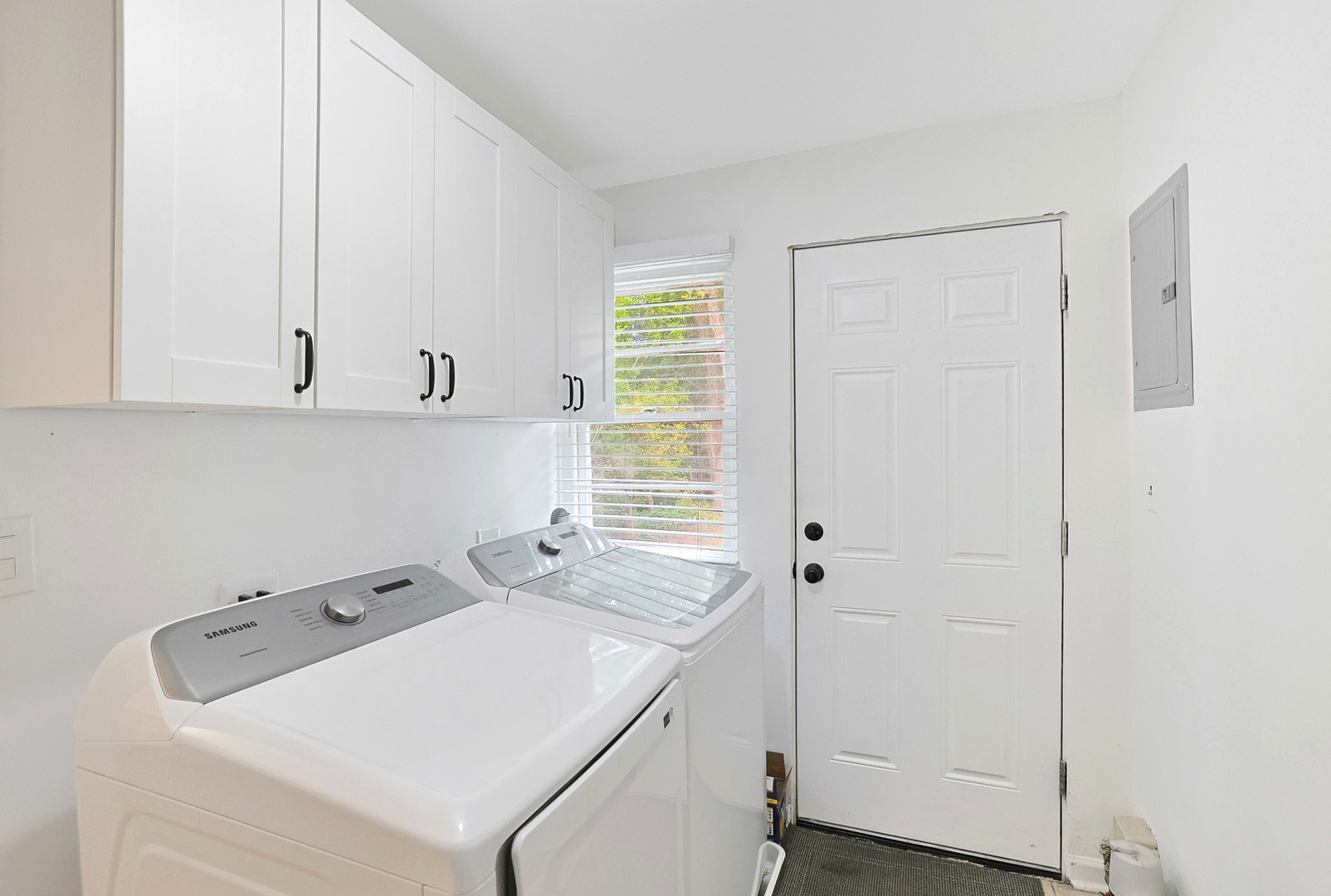 727 South Cook Street Barrington, IL 60010 - Photo 14 of 26 a room with a sink cabinets and utility