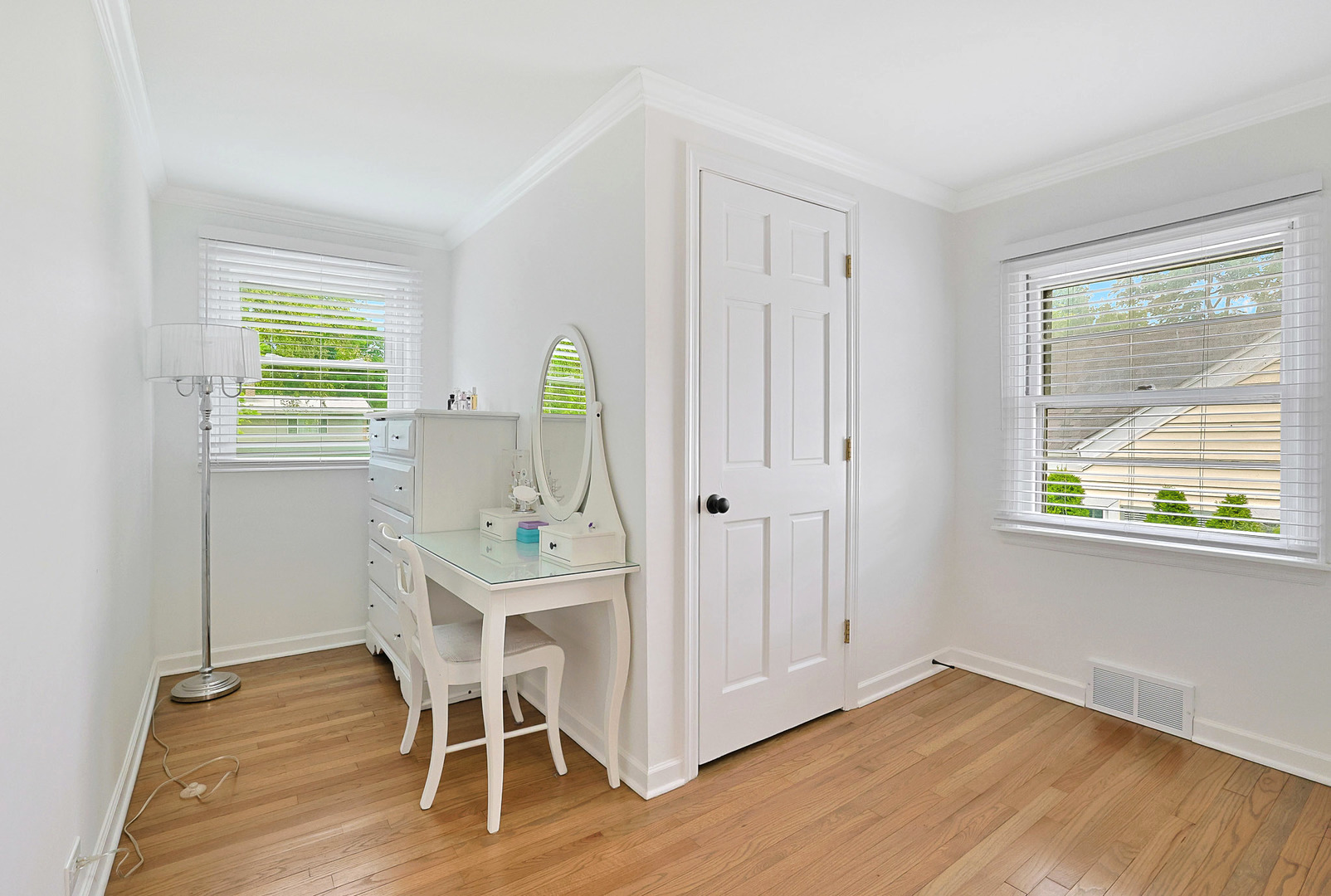 727 South Cook Street Barrington, IL 60010 - Photo 16 of 26 a dining room with wooden floor and a window