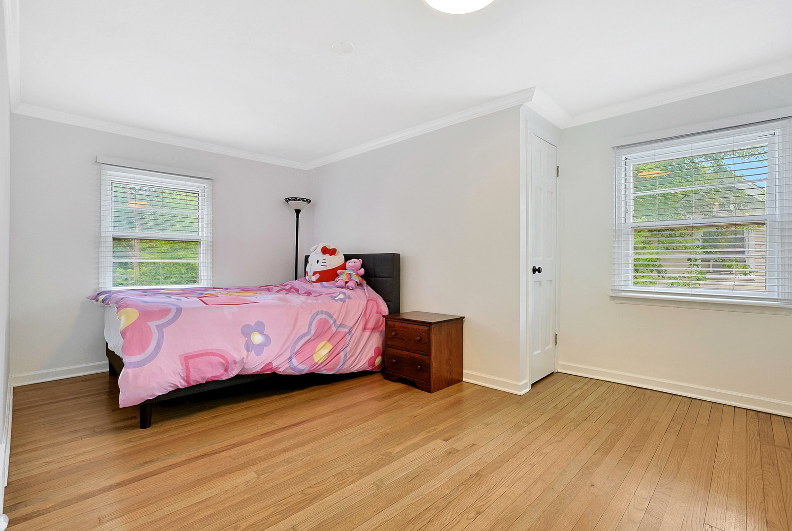 727 South Cook Street Barrington, IL 60010 - Photo 18 of 26 a bed room with a bed and a couch