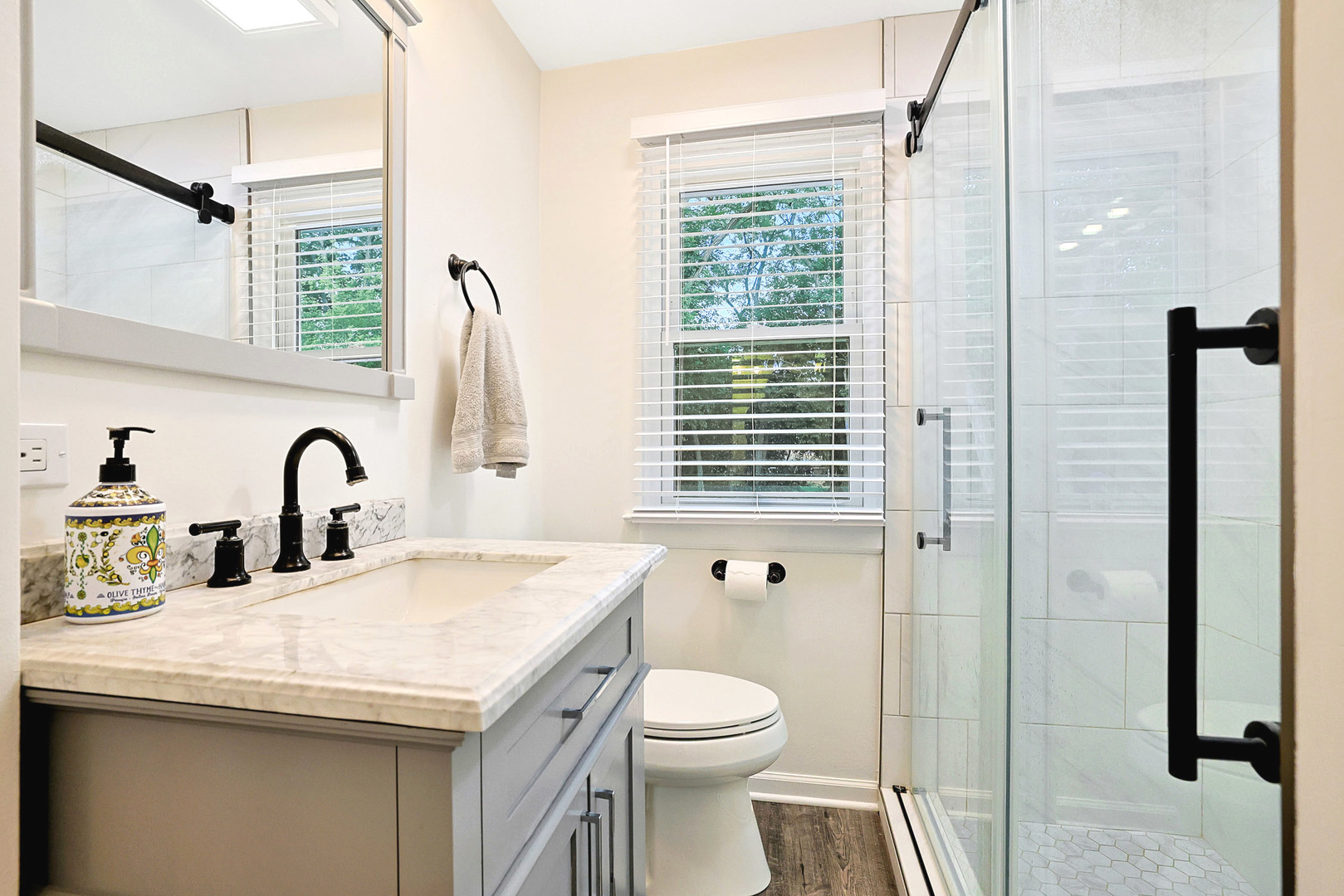 727 South Cook Street Barrington, IL 60010 - Photo 20 of 26 a view of bathroom with a sink and a toilet