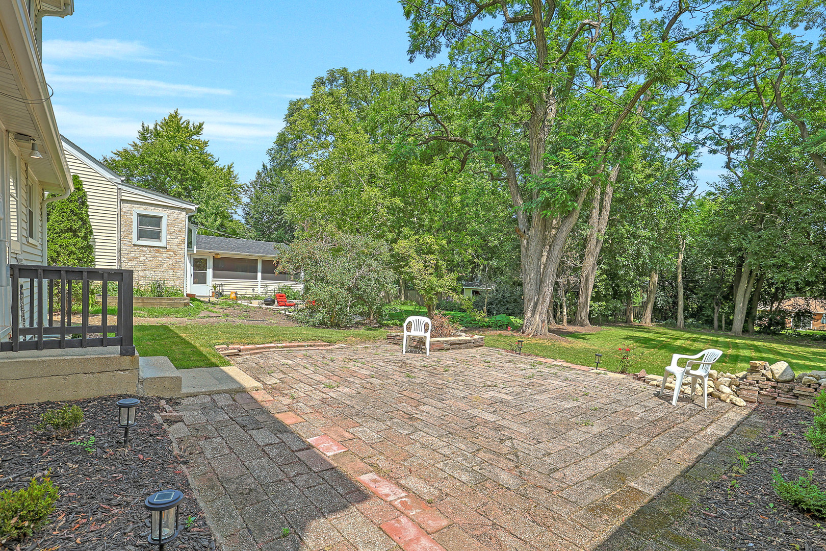 727 South Cook Street Barrington, IL 60010 - Photo 22 of 26 a house view with a backyard space