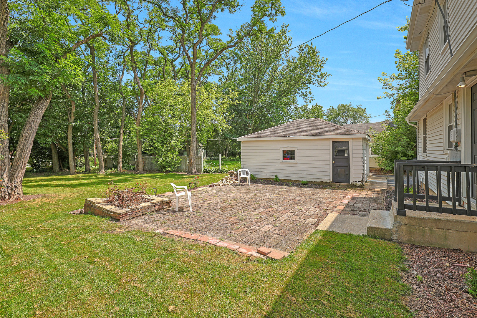 727 South Cook Street Barrington, IL 60010 - Photo 23 of 26 a front view of a house with a yard