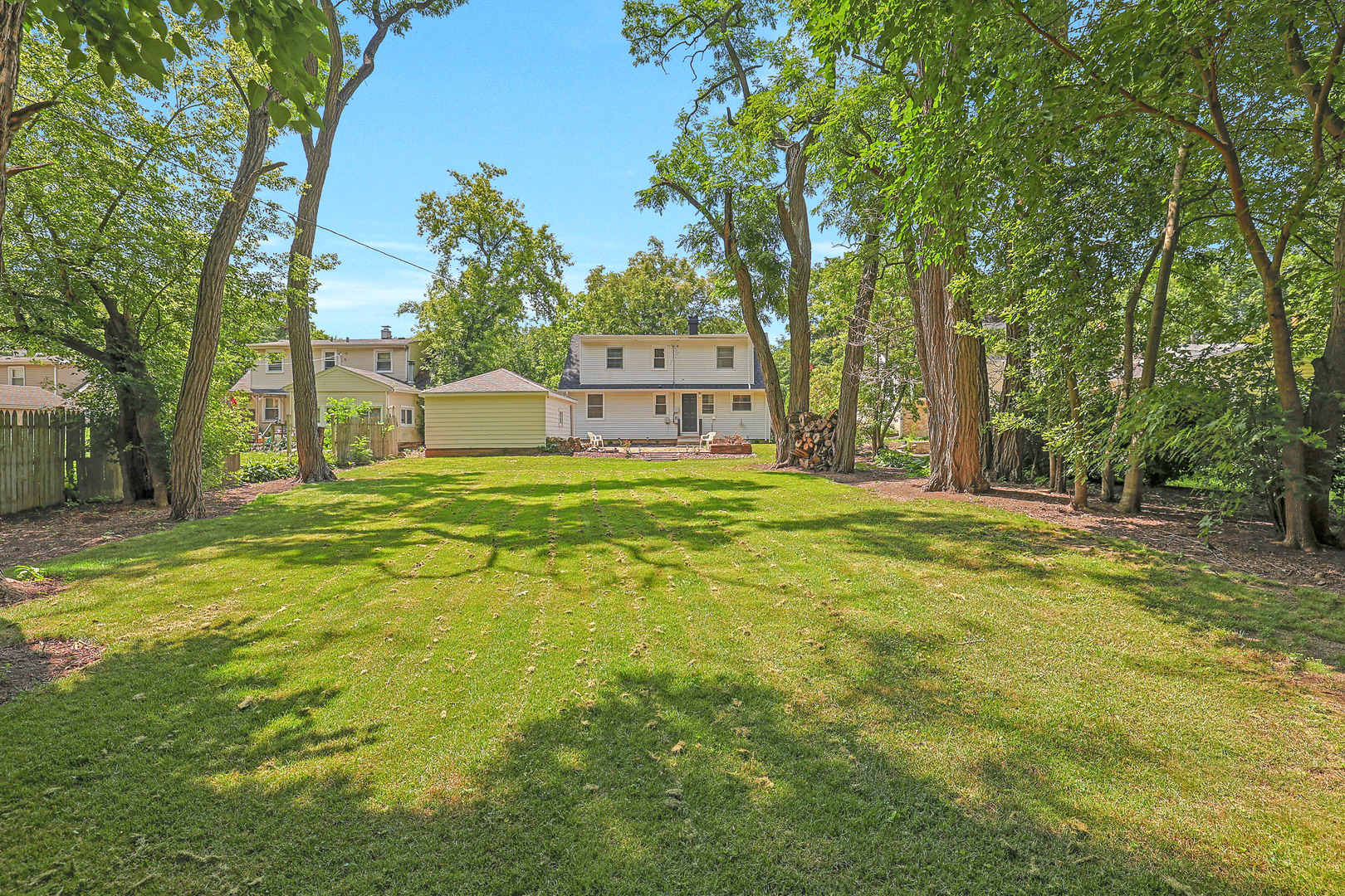 727 South Cook Street Barrington, IL 60010 - Photo 25 of 26 a house view with swimming pool in front of it