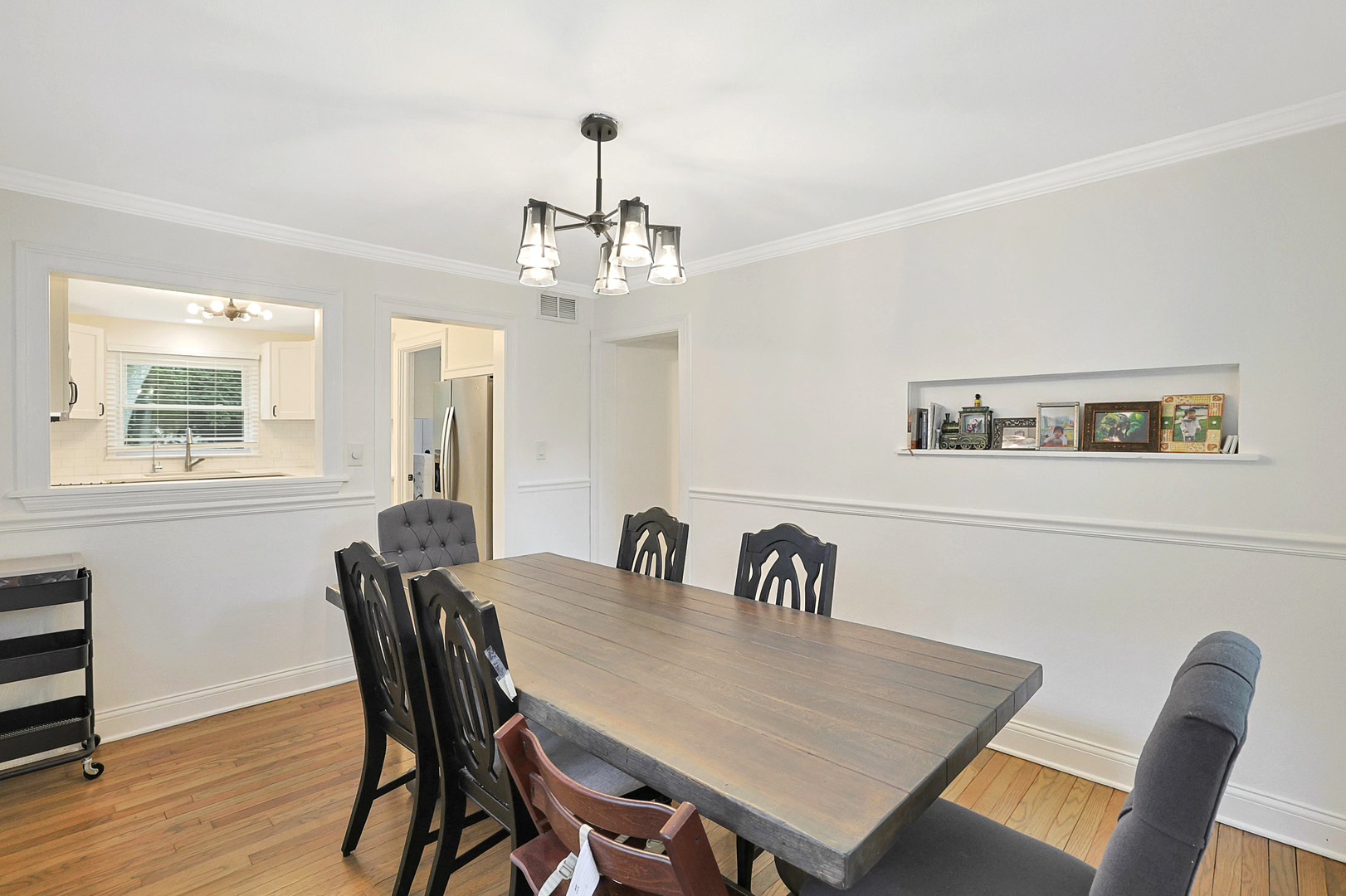 727 South Cook Street Barrington, IL 60010 - Photo 7 of 26 a view of a dining room with furniture and wooden floor