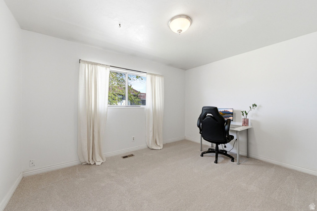 2632 North 140 West Sunset, UT 84015 - Photo 7 of 12 Office area with light carpet and baseboards