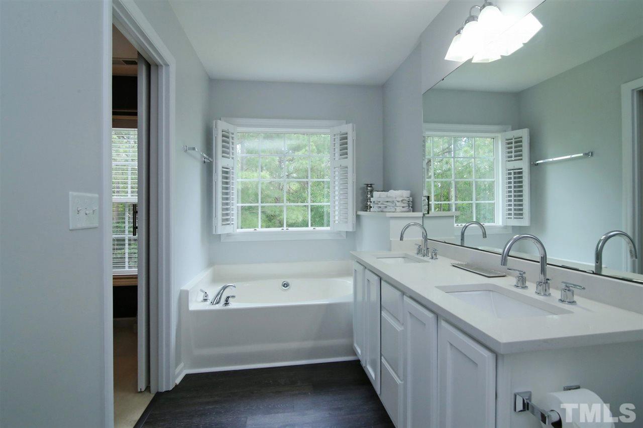 2525 Springfield Park Drive Raleigh, NC 27614 - Photo 14 of 25 Updated master bath with dual sinks and quartz countertops. Garden tub with large picture window and separate shower.
