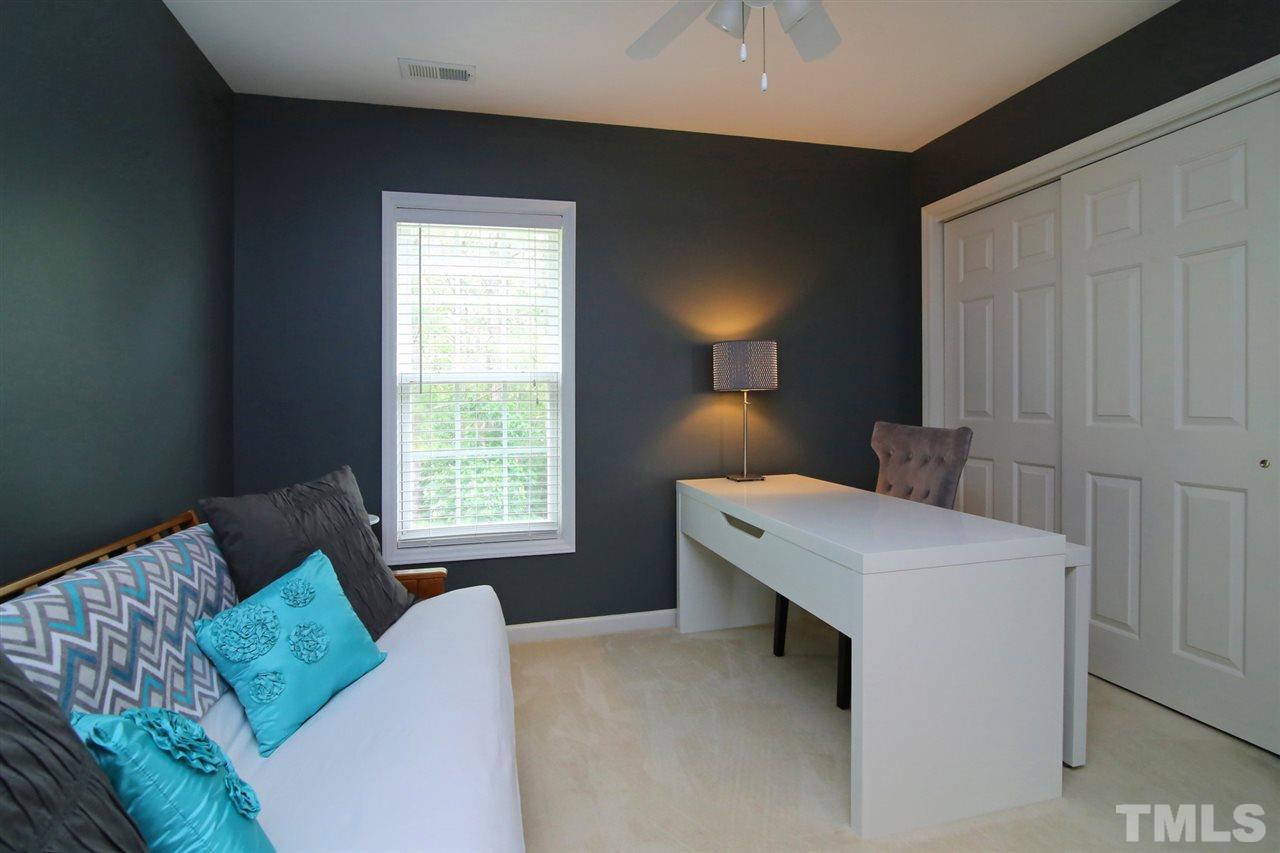 2525 Springfield Park Drive Raleigh, NC 27614 - Photo 16 of 25 One of three additional bedrooms upstairs. All bedrooms include a ceiling fan.