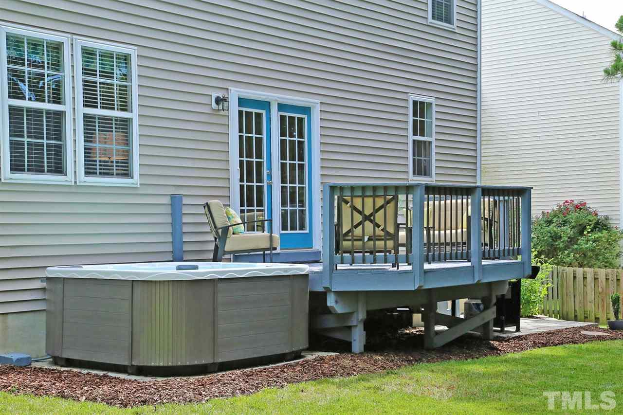 2525 Springfield Park Drive Raleigh, NC 27614 - Photo 21 of 25 Updated deck with easy access to high-end hot tub. Separate stone patio for grill and raised garden bed.