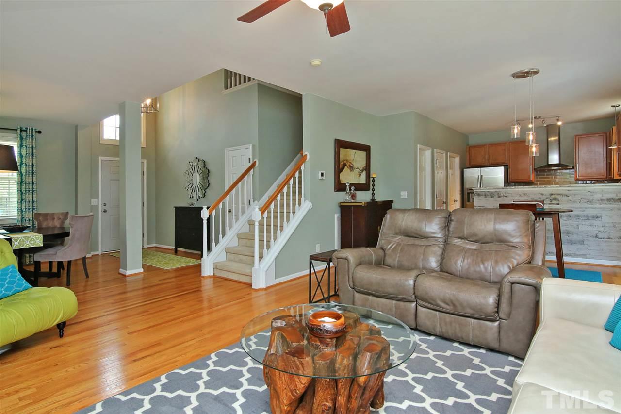 2525 Springfield Park Drive Raleigh, NC 27614 - Photo 5 of 25 True open concept living with 2-story foyer. View from living room into dining room, breakfast area and kitchen.