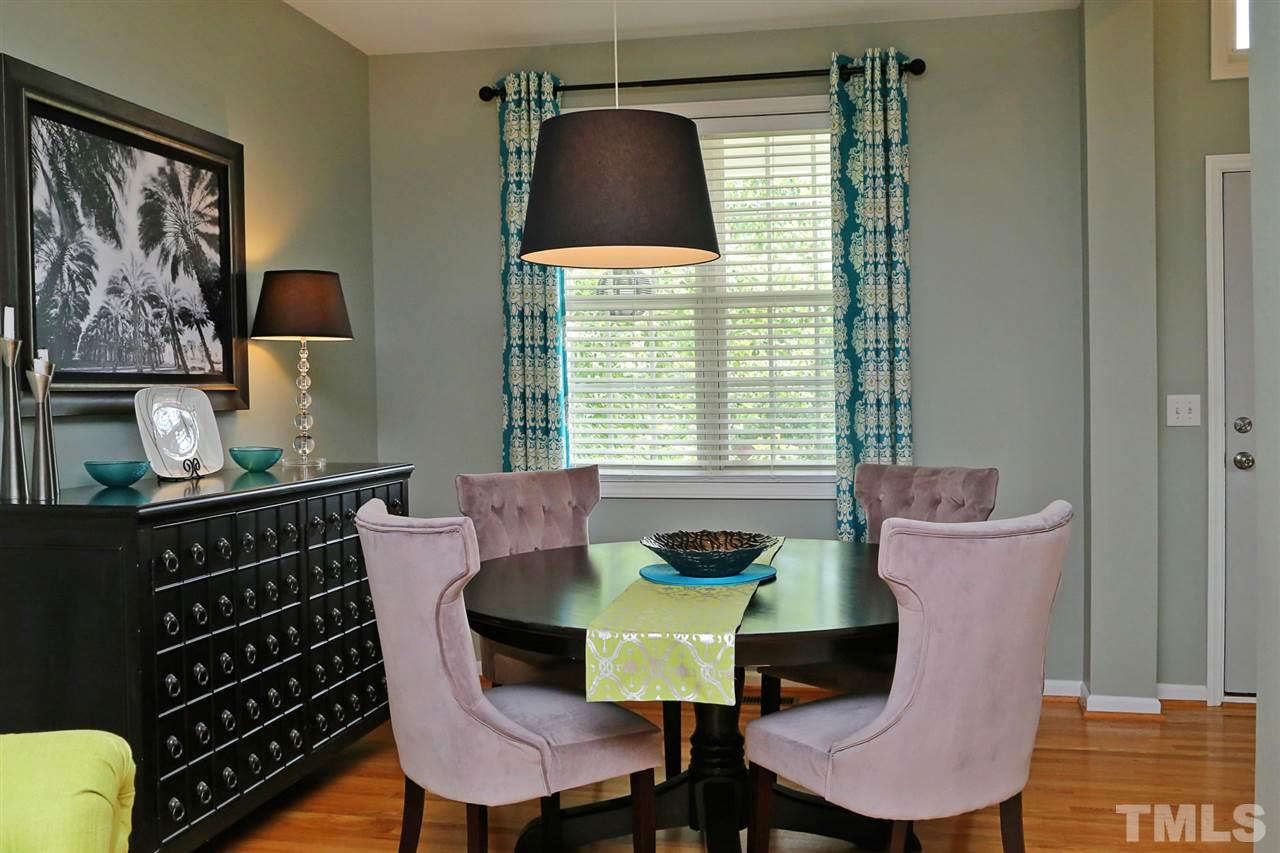 2525 Springfield Park Drive Raleigh, NC 27614 - Photo 6 of 25 Dining room is open to living room. All hardwood floors downstairs.