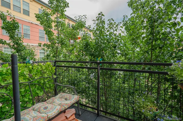 a bathroom with a toilet a sink and a mirror