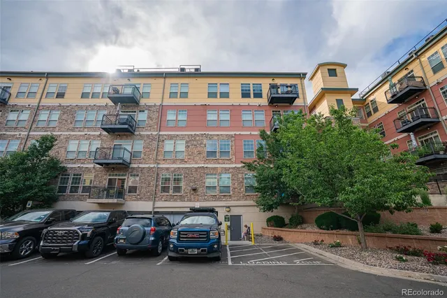 a car parked in front of a building
