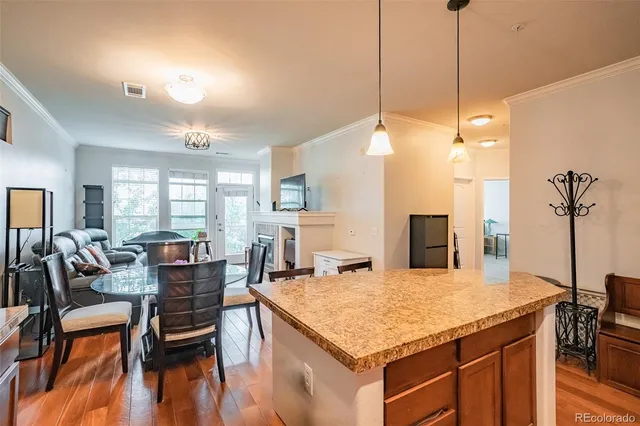 a kitchen with a table and chairs in it