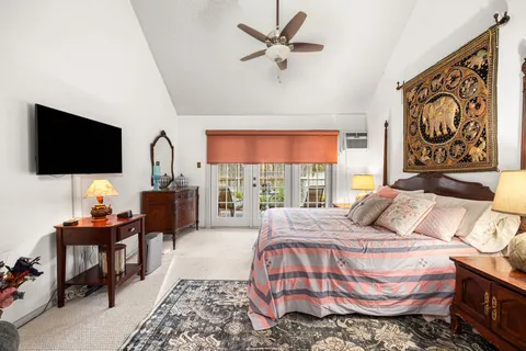 a workspace room with furniture and wooden floor