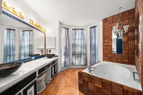 a bedroom with a bed and furniture