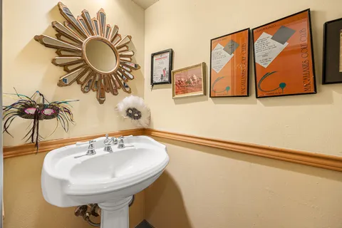 a bathroom with a sink double vanity and a shower
