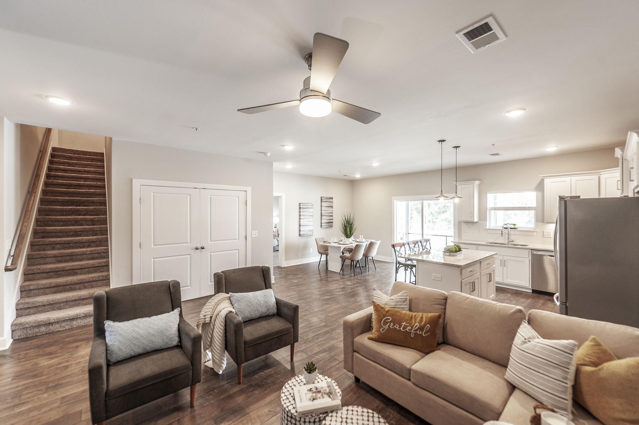 1144 Lock 4 Road, Unit A2 Gallatin, TN 37066 - Photo 19 of 66 a view of a living room kitchen and a dining room with furniture