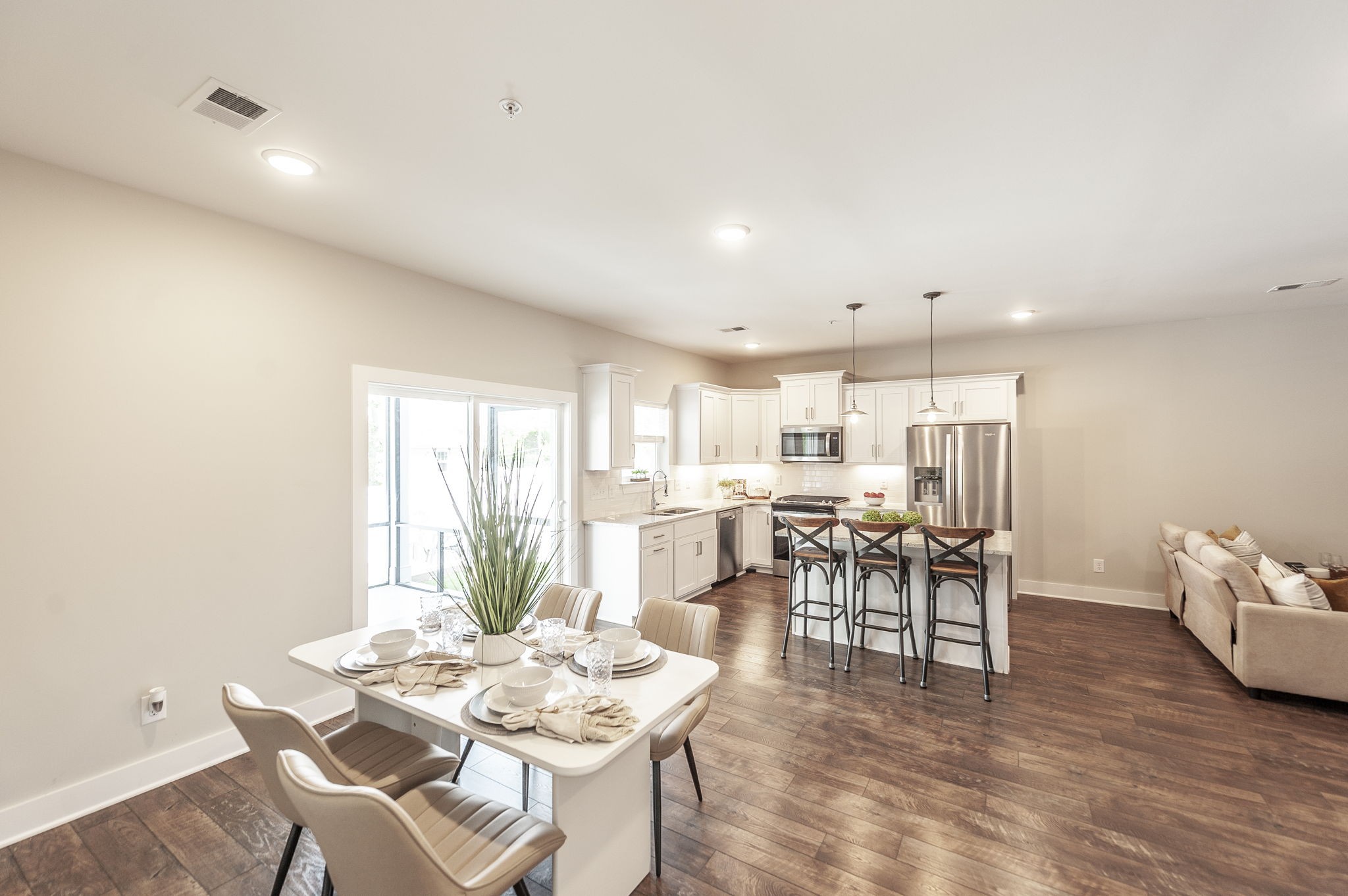 1144 Lock 4 Road, Unit A2 Gallatin, TN 37066 - Photo 30 of 66 a view of a dining room with furniture window and wooden floor