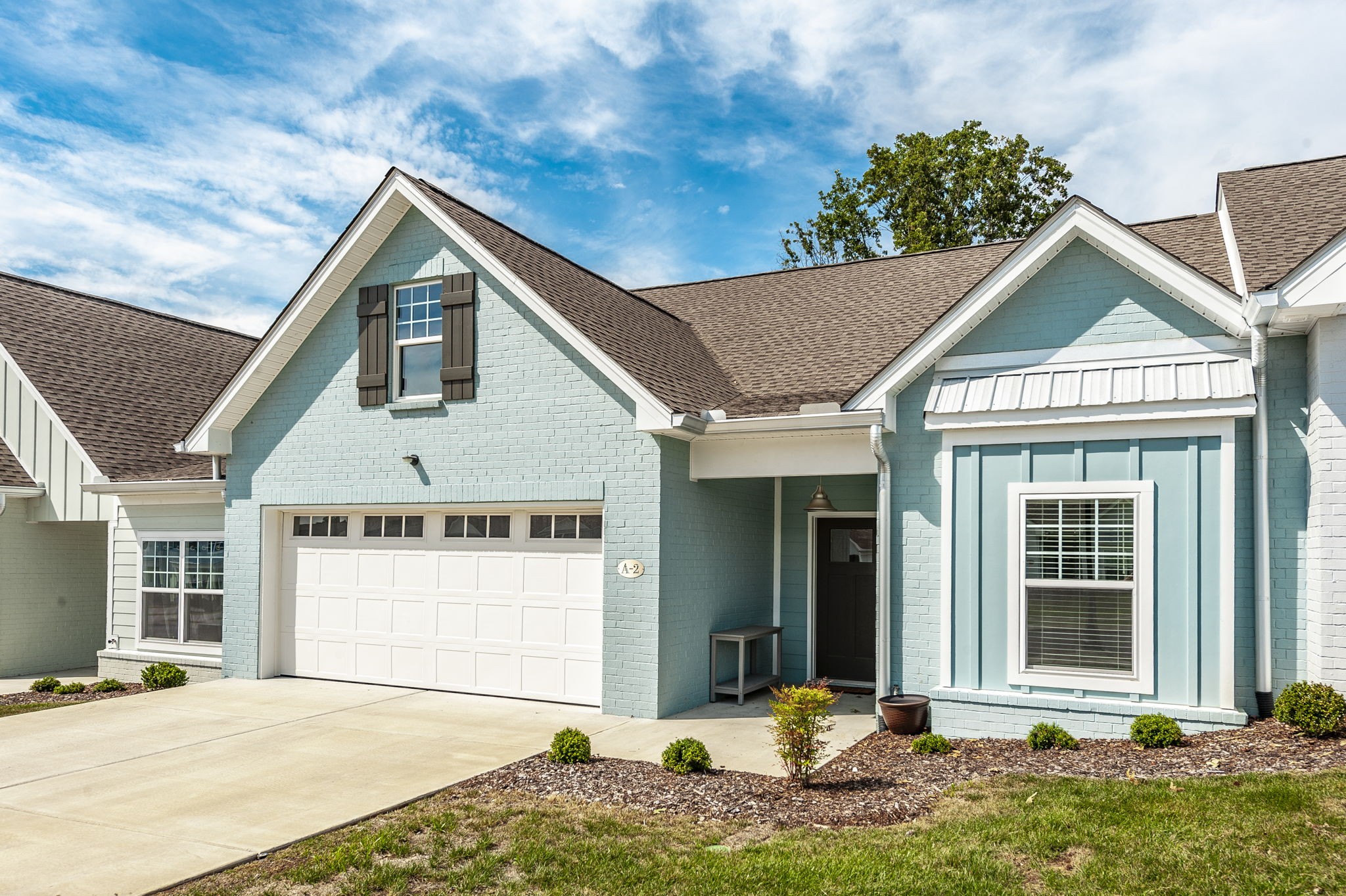 1144 Lock 4 Road, Unit A2 Gallatin, TN 37066 - Photo 3 of 66 a front view of a house with a yard