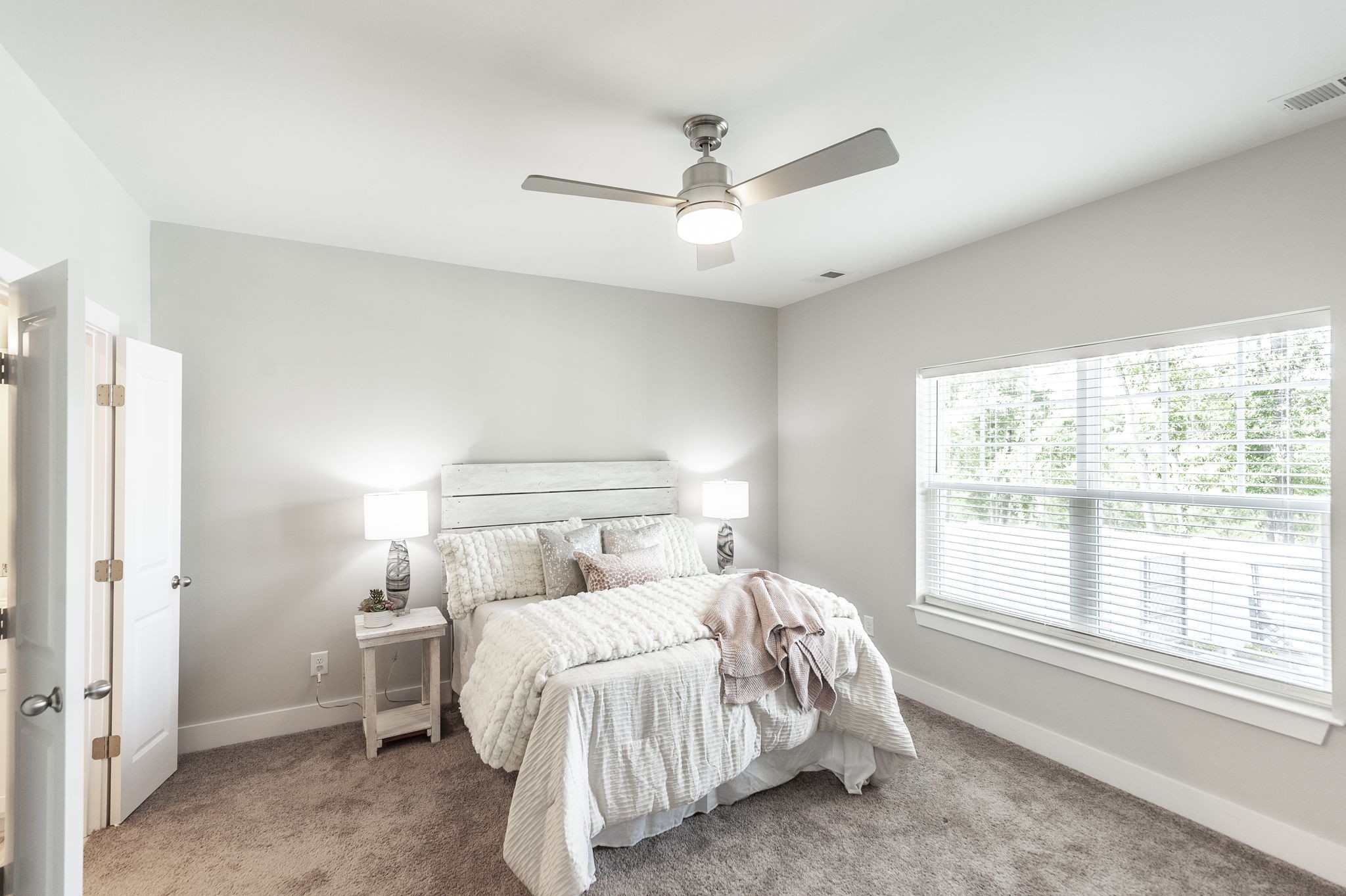 1144 Lock 4 Road, Unit A2 Gallatin, TN 37066 - Photo 33 of 66 a bedroom with a bed and a large window