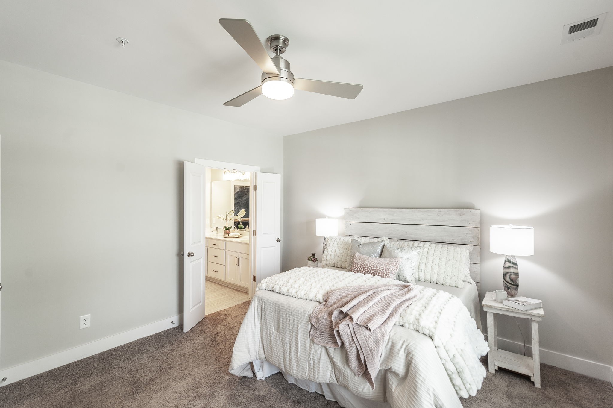 1144 Lock 4 Road, Unit A2 Gallatin, TN 37066 - Photo 34 of 66 a bedroom with a bed and a chandelier