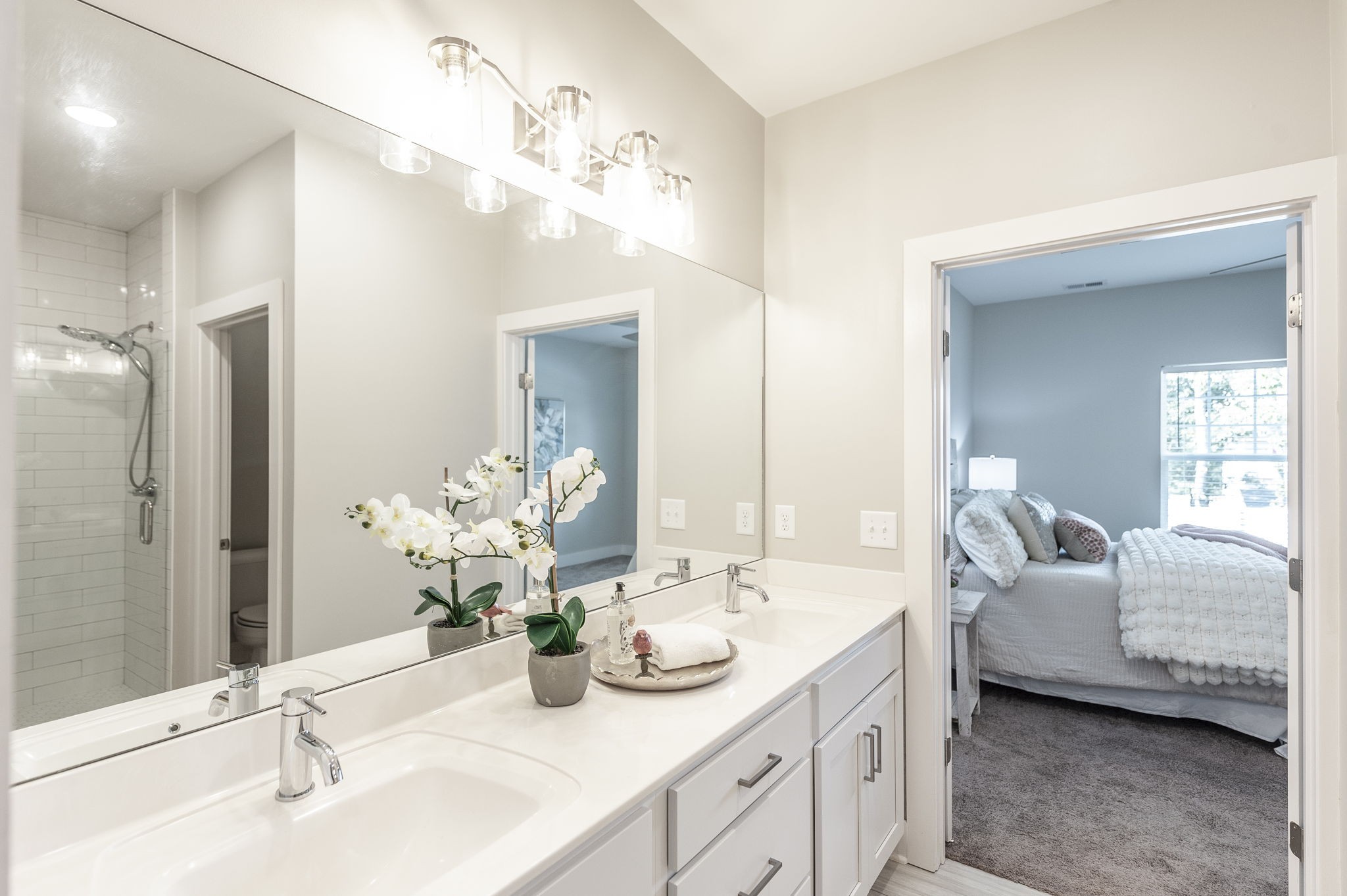 1144 Lock 4 Road, Unit A2 Gallatin, TN 37066 - Photo 37 of 66 a bathroom with a double vanity sink and a mirror