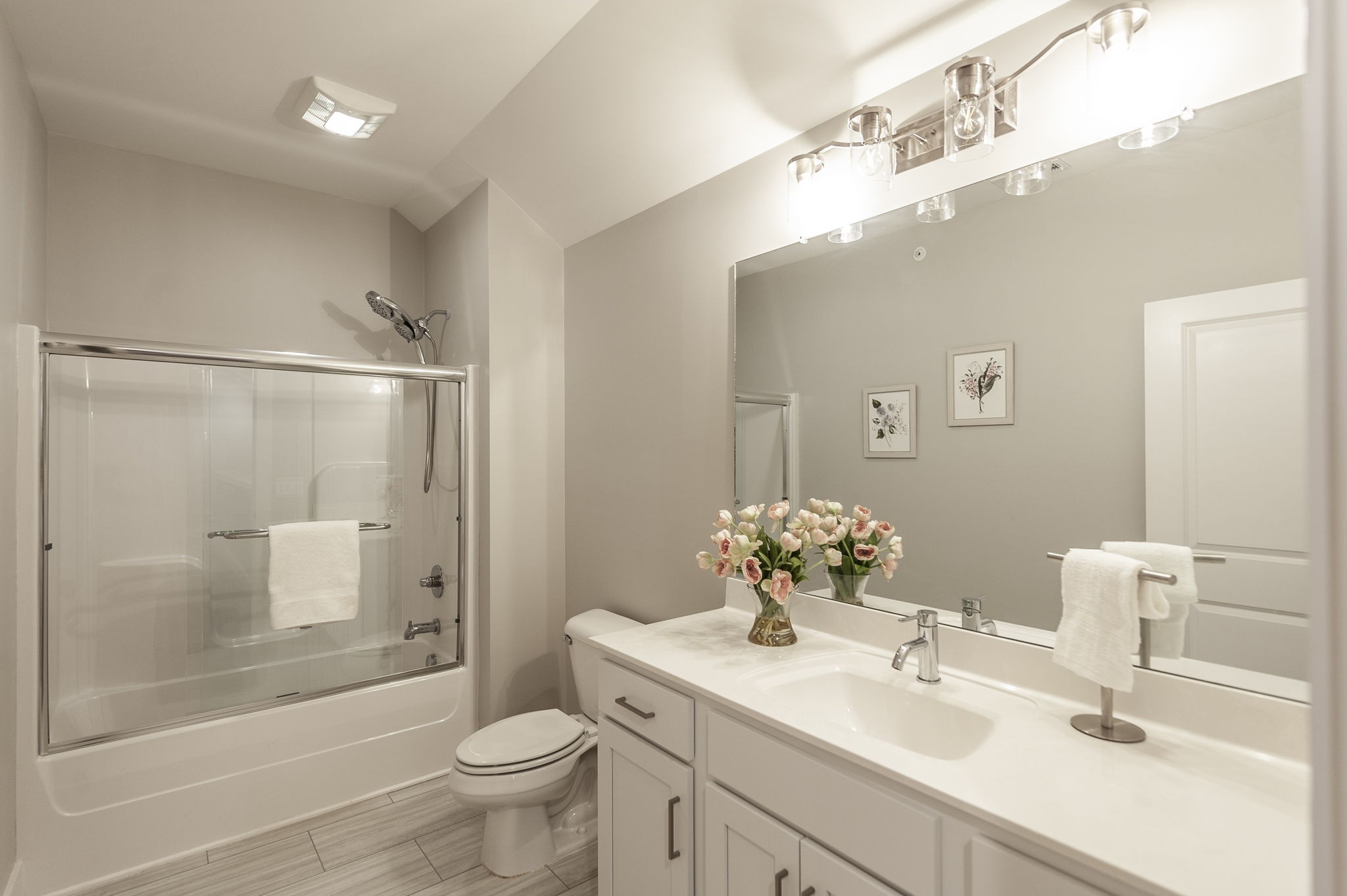 1144 Lock 4 Road, Unit A2 Gallatin, TN 37066 - Photo 45 of 66 a bathroom with a sink toilet mirror and shower