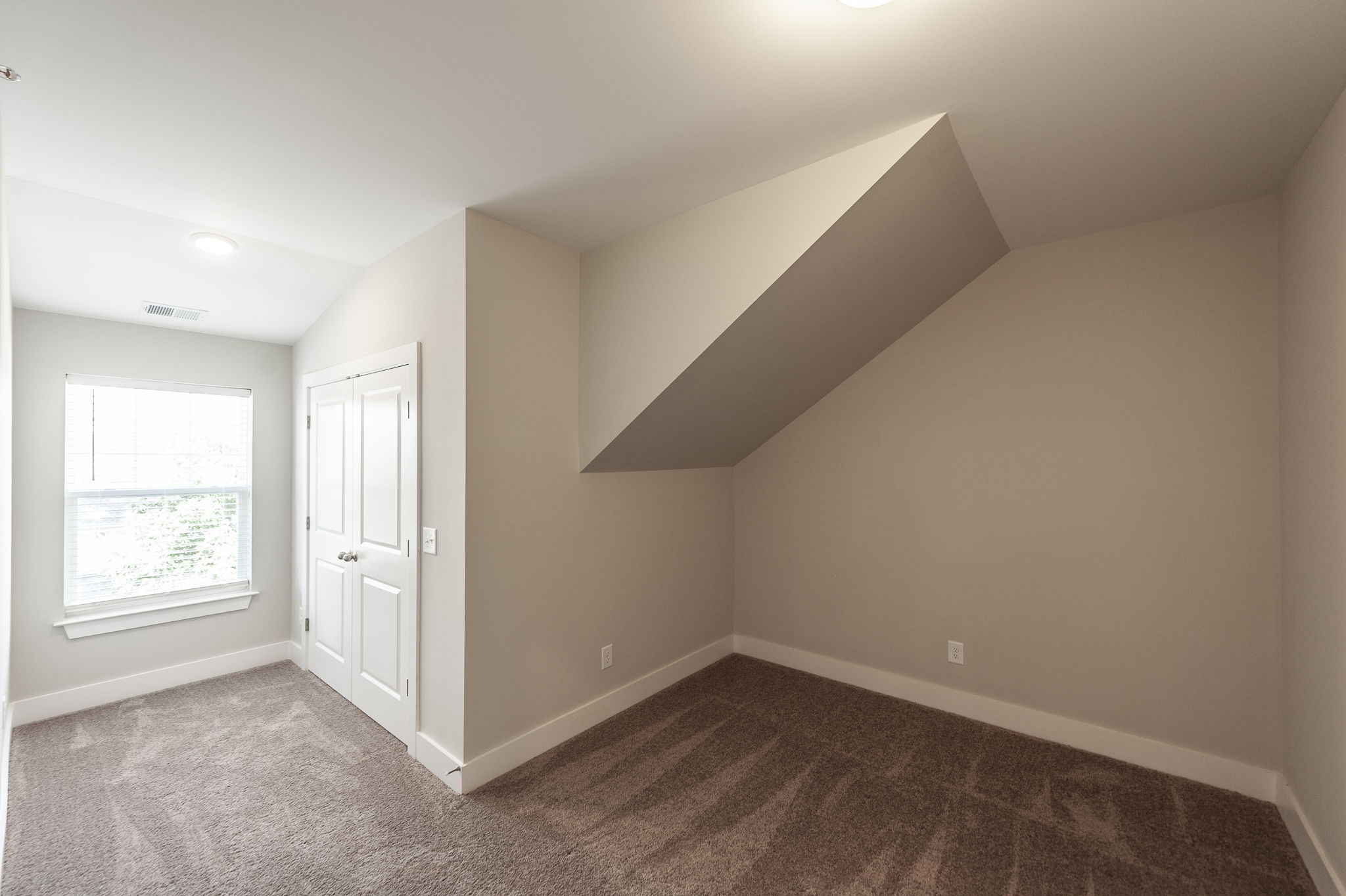 1144 Lock 4 Road, Unit A2 Gallatin, TN 37066 - Photo 46 of 66 a view of an empty room with a window