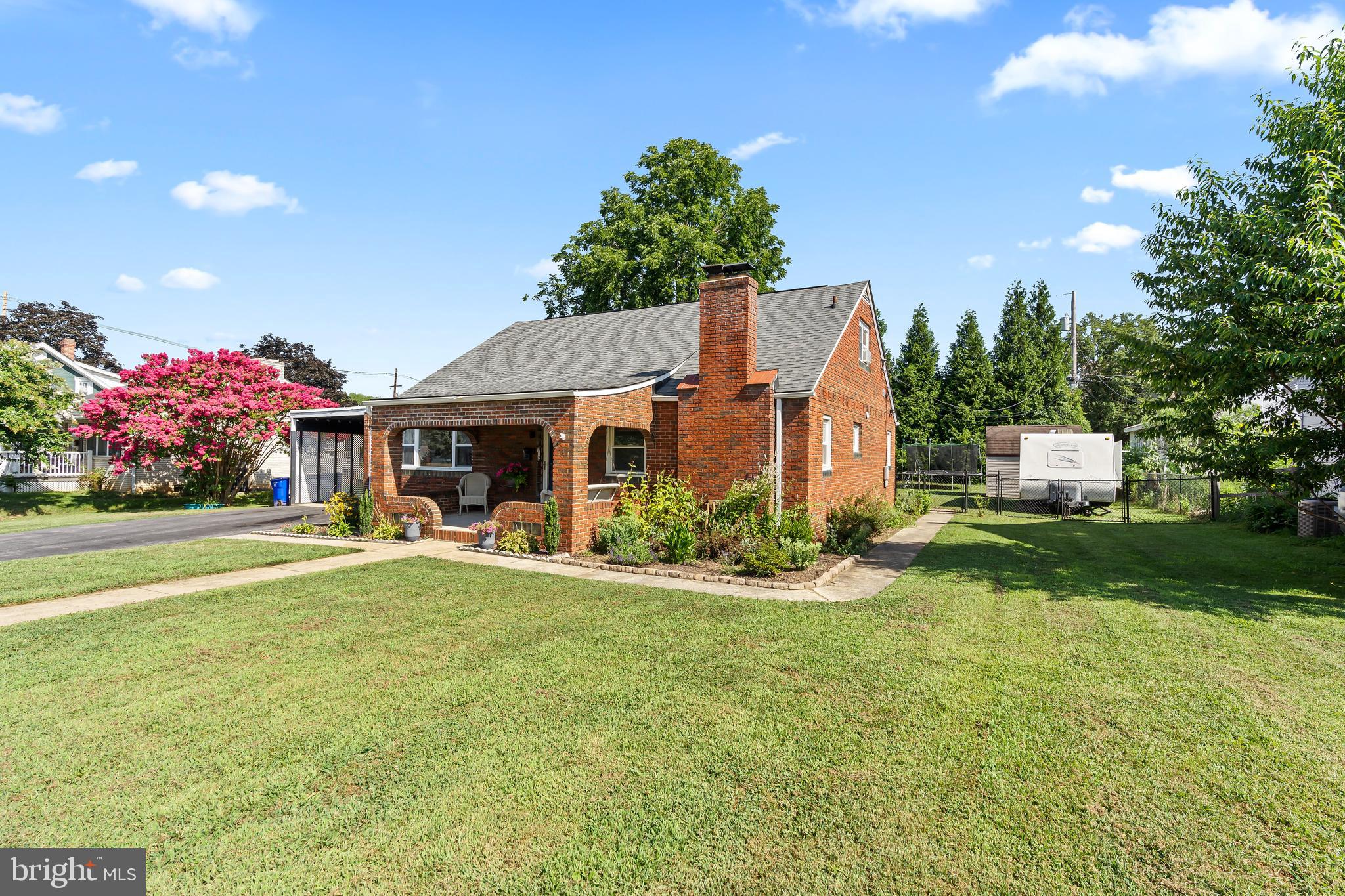 Side yard offers space for an RV