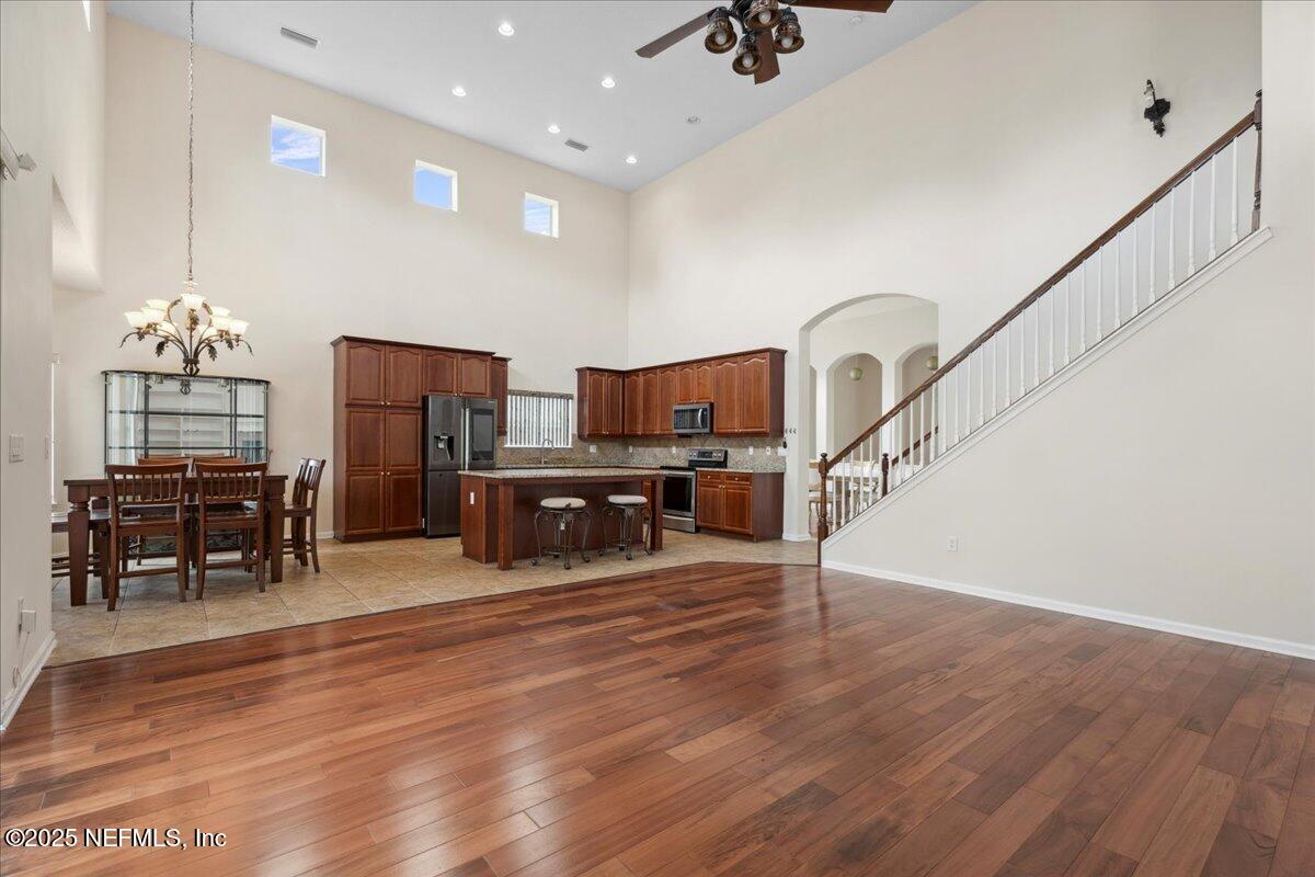1127 Emilys Walk Lane West Jacksonville, FL 32221 - Photo 21 of 43 a view of a kitchen with furniture and a chandelier