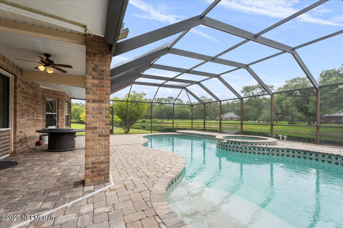 1127 Emilys Walk Lane West Jacksonville, FL 32221 - Photo 31 of 43 a view of a swimming pool with a patio