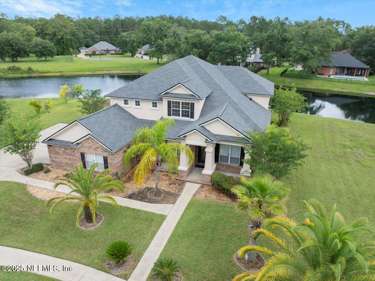 1127 Emilys Walk Lane West Jacksonville, FL 32221 - Photo 36 of 43 an aerial view of a house with pool