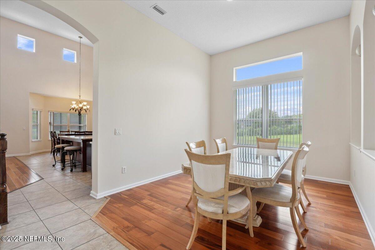 1127 Emilys Walk Lane West Jacksonville, FL 32221 - Photo 8 of 43 a view of a dining room with furniture window and outside view