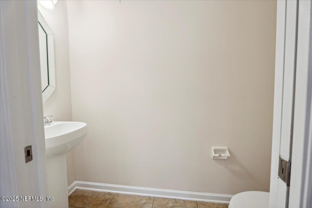 1127 Emilys Walk Lane West Jacksonville, FL 32221 - Photo 10 of 43 a bathroom with a toilet