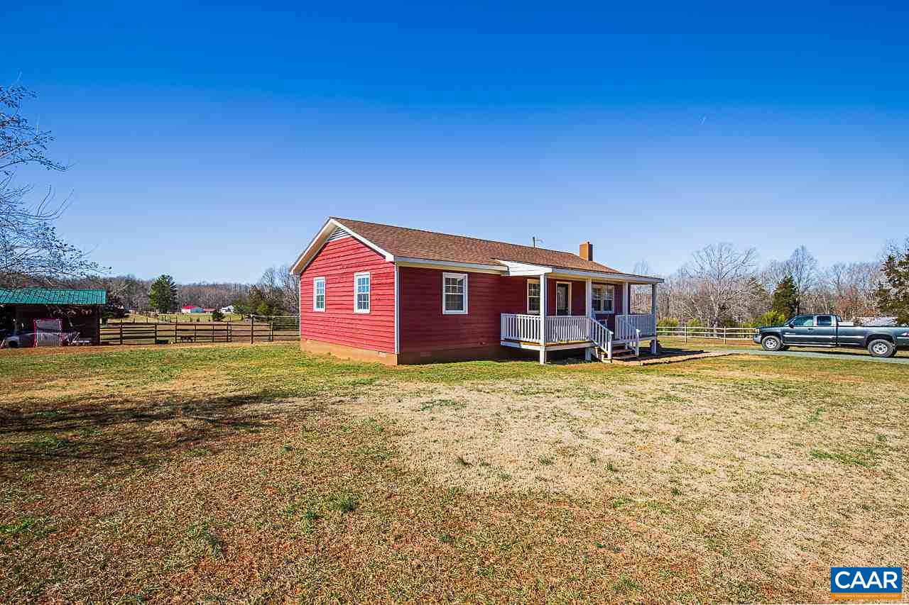 8031 Howardsville Road Howardsville, VA 24562 - Photo 11 of 30 a view of a house with a yard