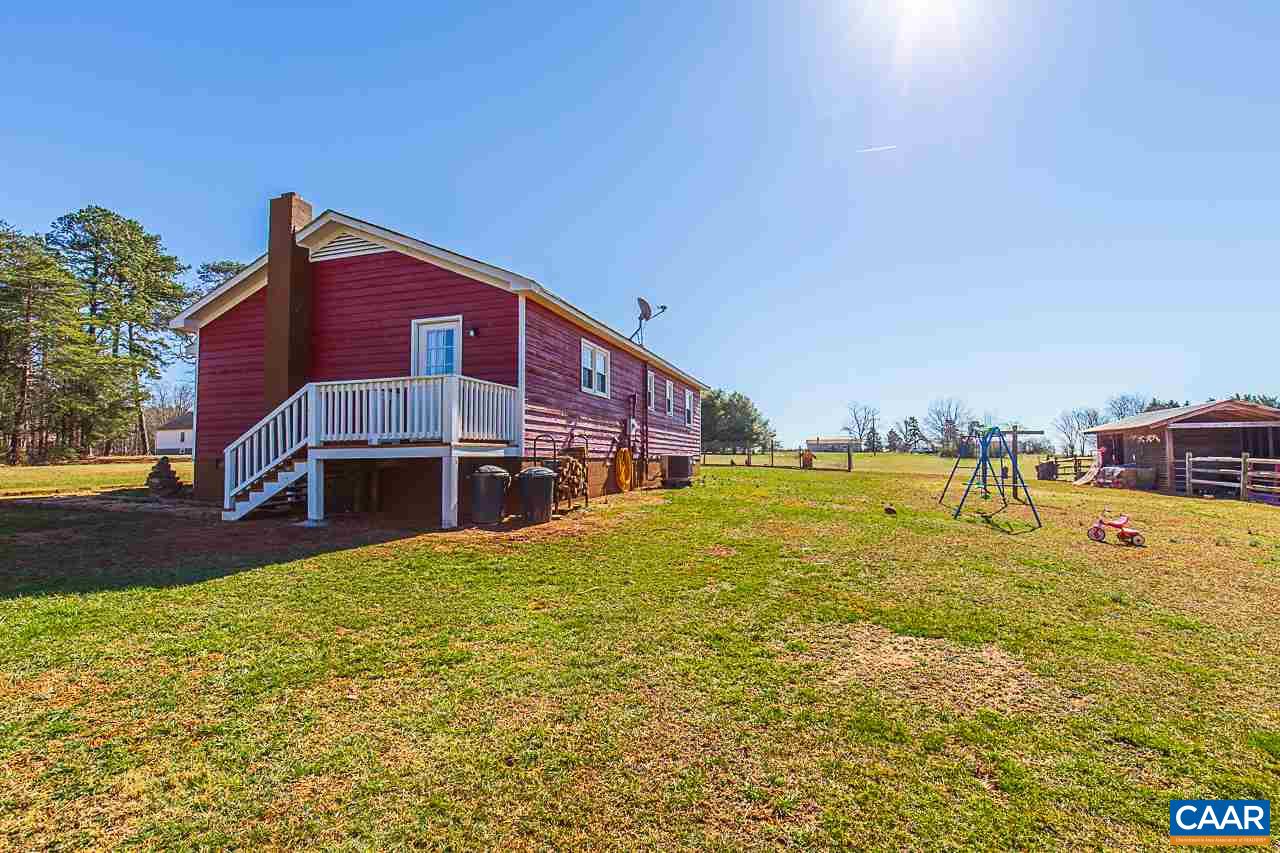 8031 Howardsville Road Howardsville, VA 24562 - Photo 2 of 30 a view of a house with a yard