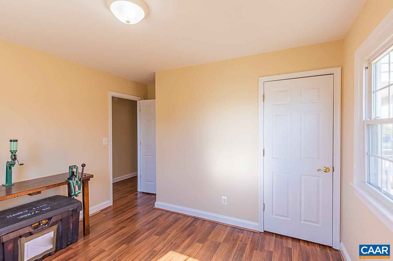 8031 Howardsville Road Howardsville, VA 24562 - Photo 25 of 30 a view of a room with wooden floor