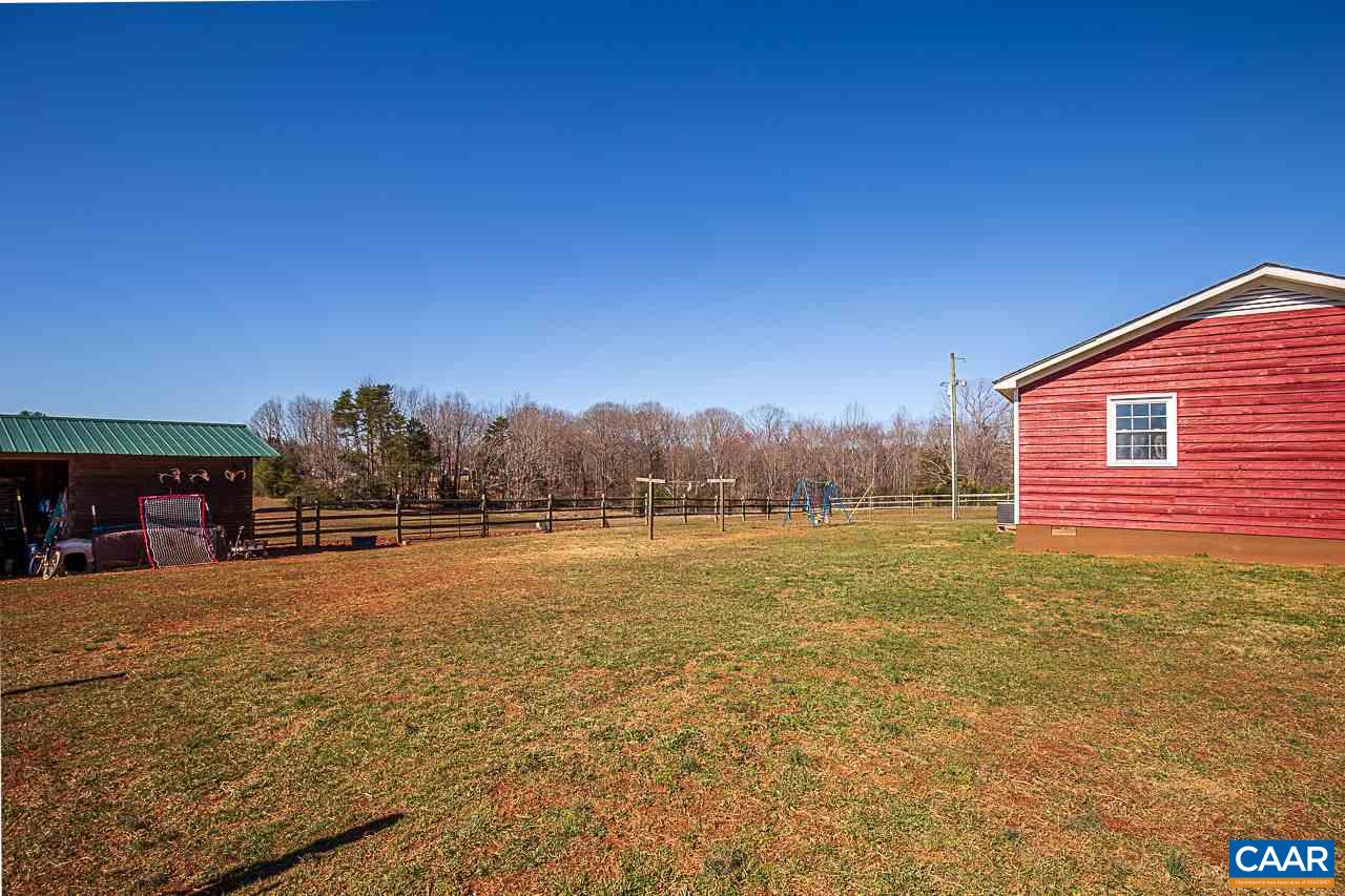 8031 Howardsville Road Howardsville, VA 24562 - Photo 10 of 30 a view of a yard with a house in the background