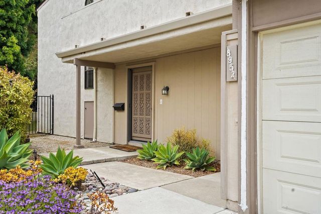 a workspace with furniture and window