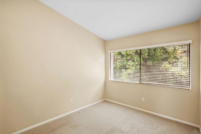 a terrace of a house with outdoor seating