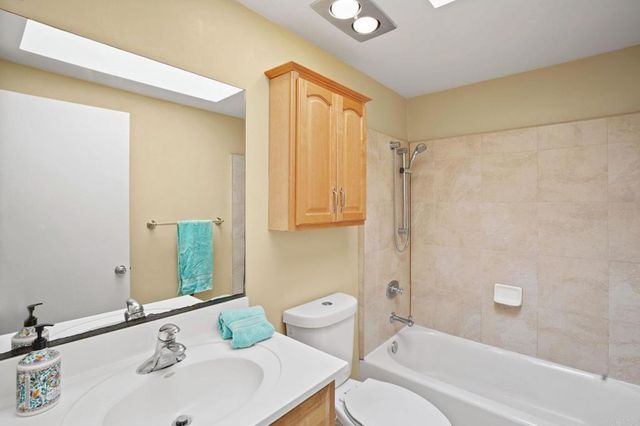 a view of a chairs and table in patio