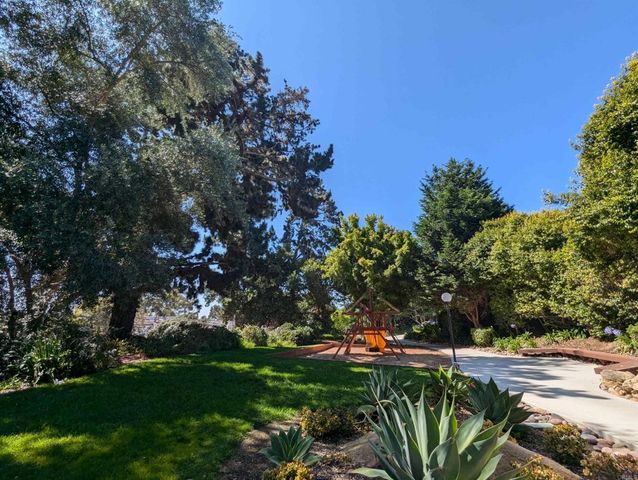 a view of outdoor space with signage and flags