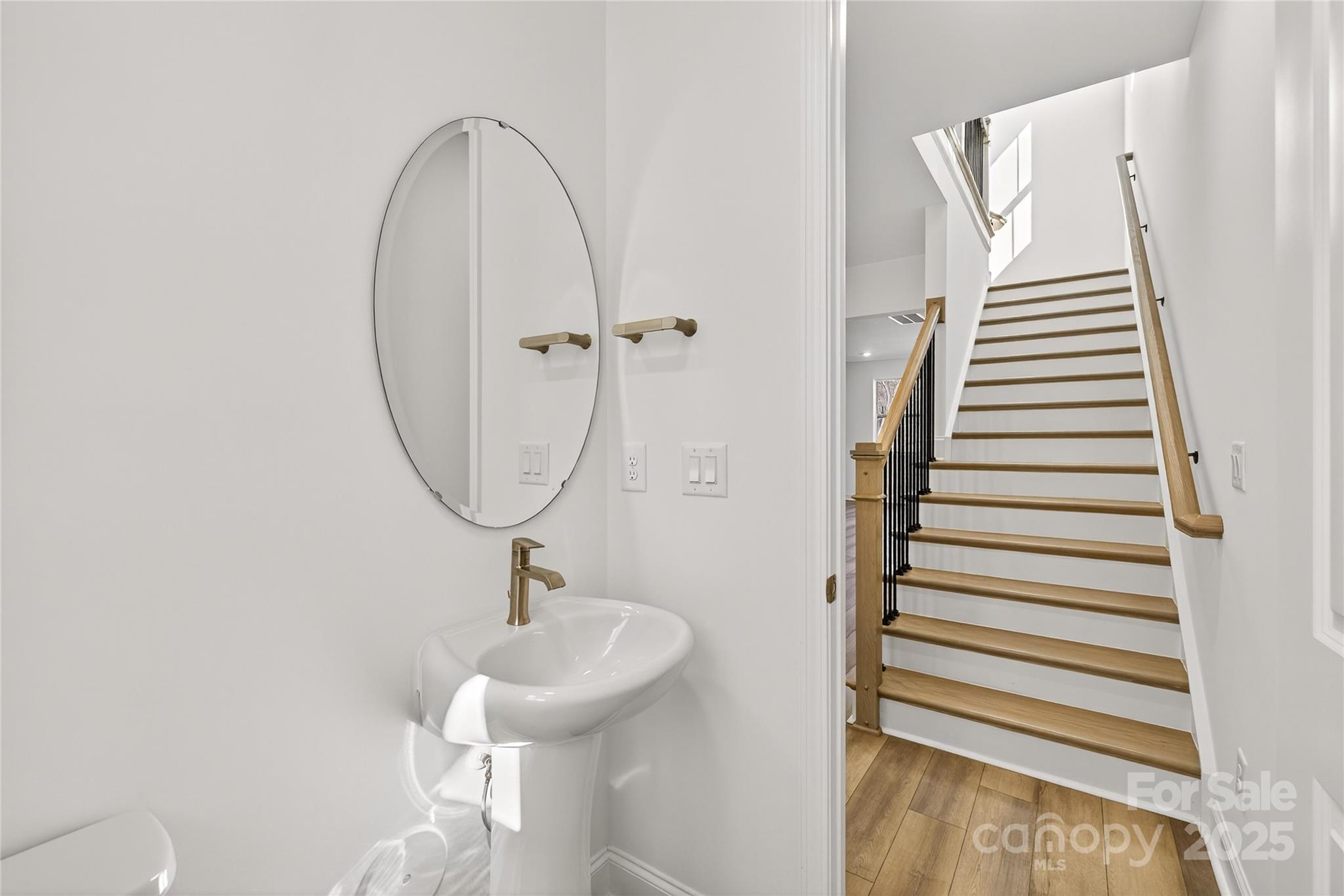 520 Zinc Drive Tega Cay, SC 29708 - Photo 12 of 20 a bathroom with a sink and a mirror