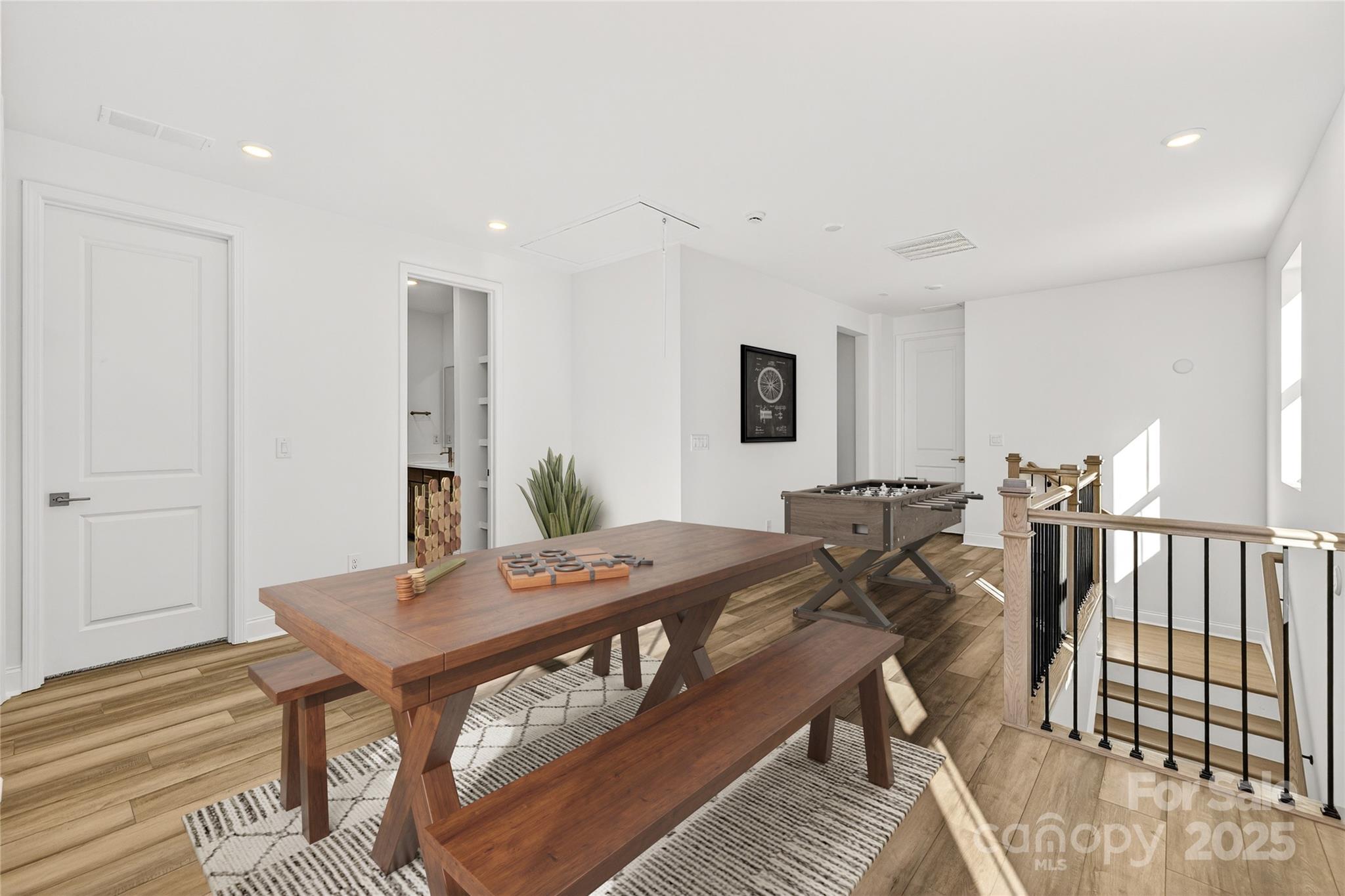 520 Zinc Drive Tega Cay, SC 29708 - Photo 14 of 20 a view of a dining room with furniture