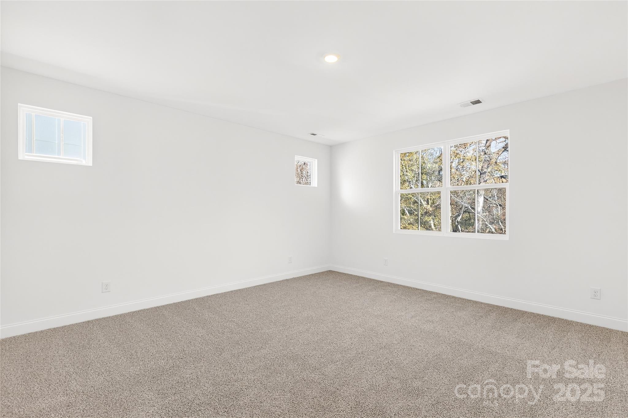 520 Zinc Drive Tega Cay, SC 29708 - Photo 15 of 20 an empty room with windows