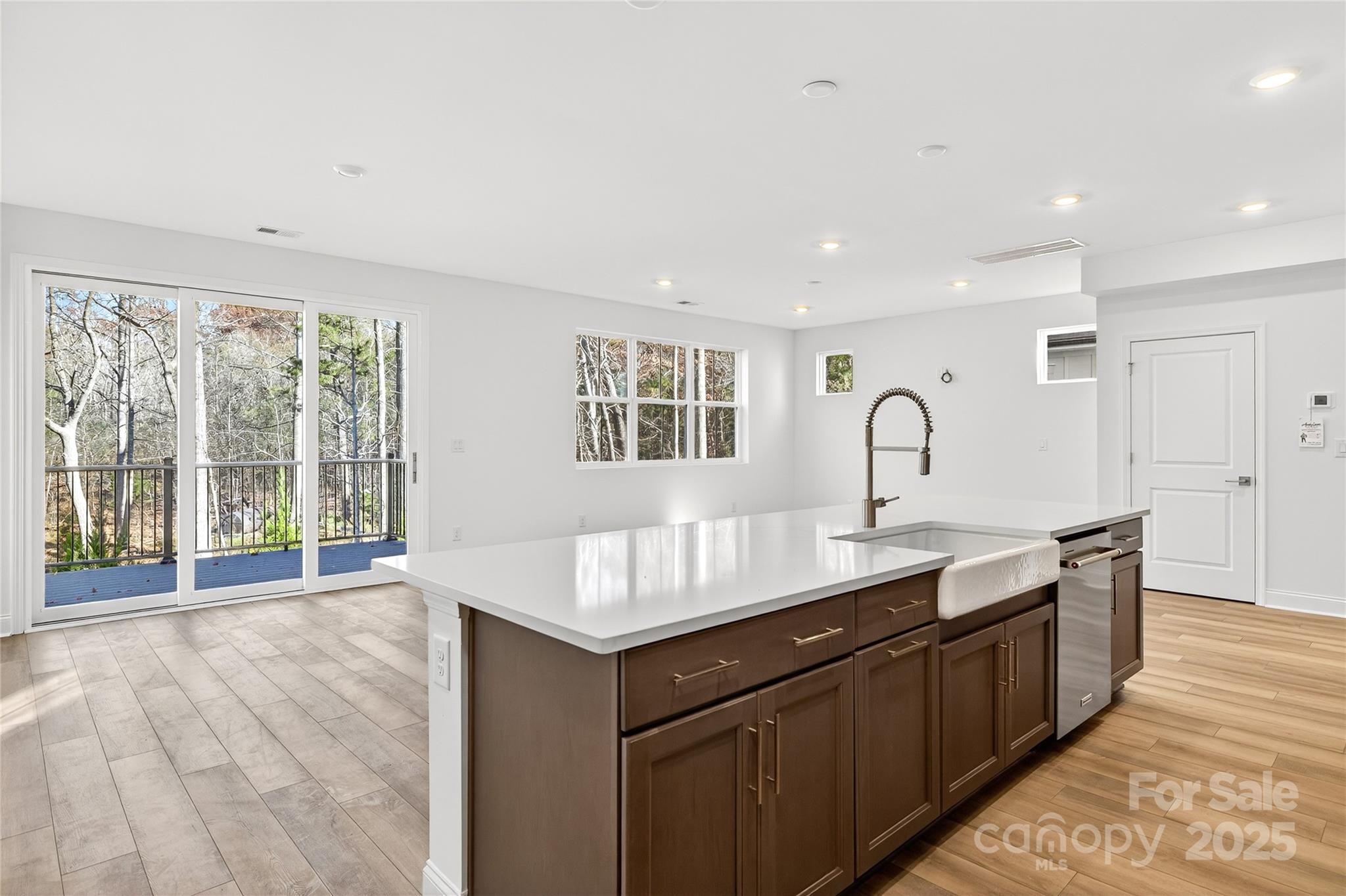 520 Zinc Drive Tega Cay, SC 29708 - Photo 4 of 20 a kitchen with granite countertop a sink and a stove